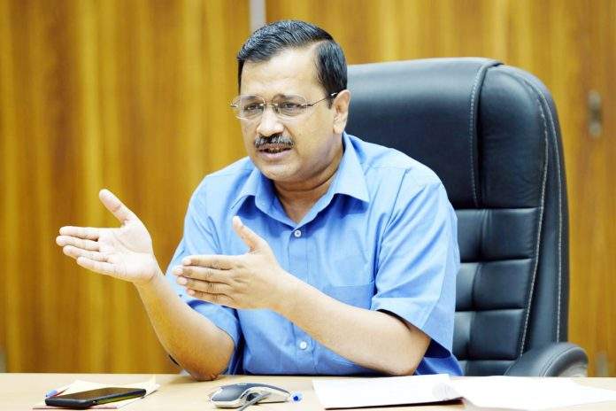 Delhi Chief Minister Arvind Kejriwal during an interaction with traders